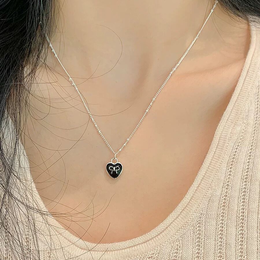 足银蝴蝶结爱心锁骨链女时尚轻奢高级感毛衣链新款潮S999纯银项链