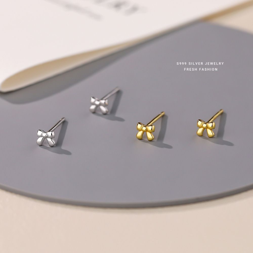 可爱迷你蝴蝶结耳钉女s999纯银甜美小巧百搭时尚足银耳饰耳骨钉