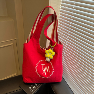 红色帆布包韩系慵懒风2025超火夏季双面托特包通勤包大容量单肩包
