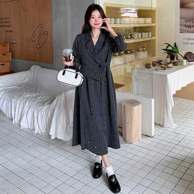 黑色拼接连衣裙女2025年秋季新款超好看不规则蕾丝气质A字长裙潮