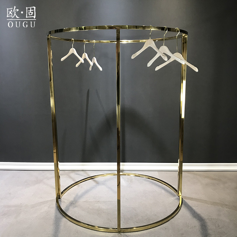 高端服装店弧形中岛陈列女装展示架不锈钢钛金镜面婚纱落地式货架
