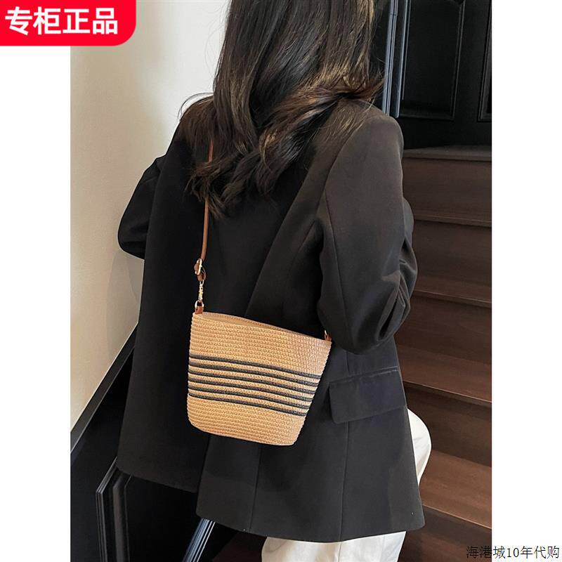 日本ファッションバッグ条纹编织女包草编包斜挎水桶包休闲沙滩包