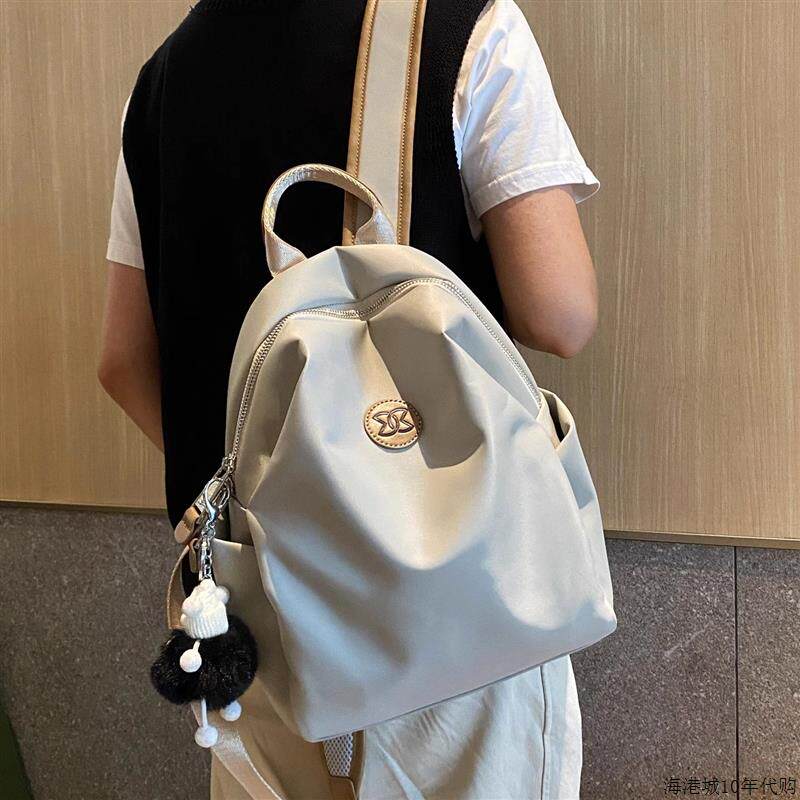 香港双肩包女2025新款时尚旅行揹包大容量通勤轻便防水书包电脑包