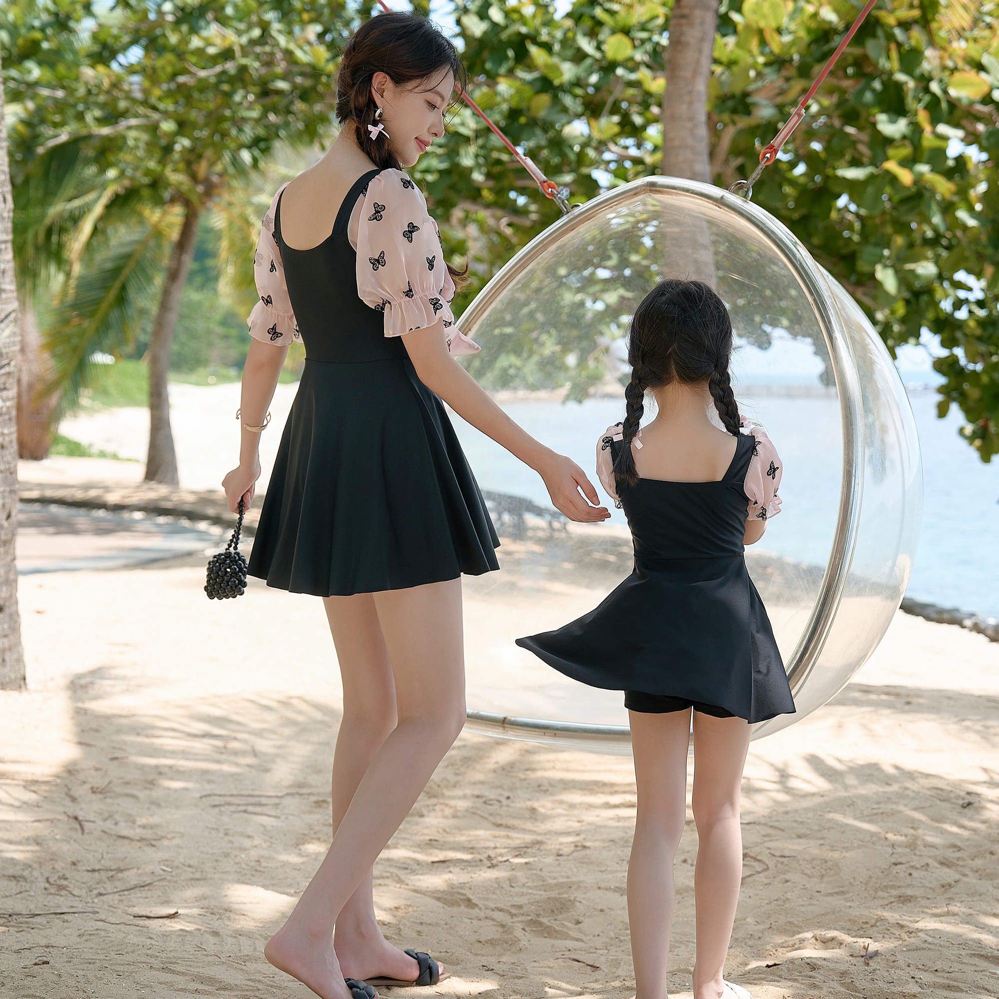 温泉亲子泳衣女母女连体裙式黑色显瘦平角可爱蝴蝶结儿童游泳衣