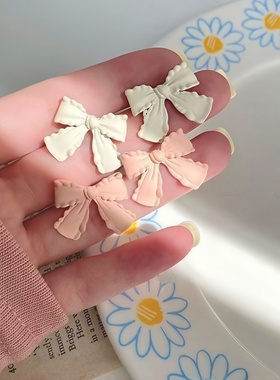 日韩甜美蝴蝶结耳钉女小众设计可爱粉色白色小巧耳饰
