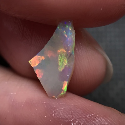 厂家天然欧泊/黑欧泊/澳宝原石原料/粗磨石/DIY练手料0.95ct