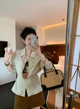 ~浅黄色条纹衬衫女设计感小众收腰叠穿衬衣法式上衣2025新款