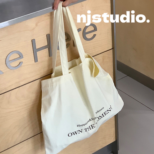 文艺休闲帆布包大容量女款简约小个子韩系字母通勤单肩托特包装书