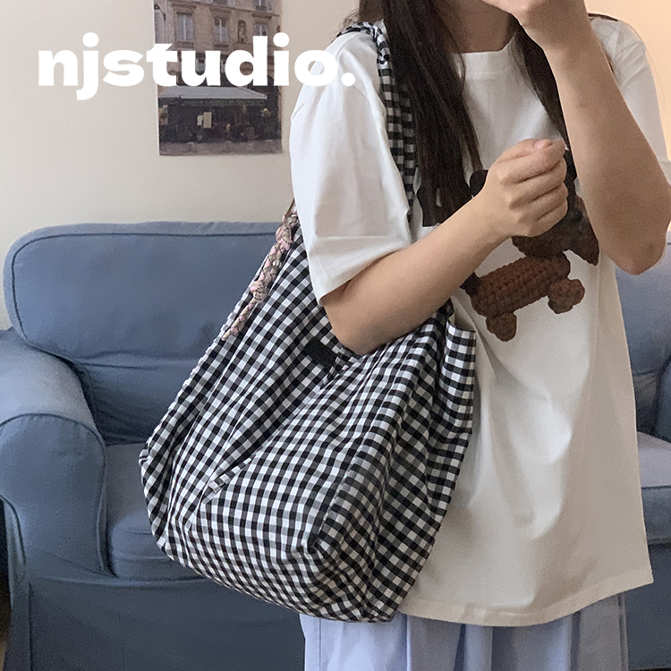 韩系ins风黑白格子帆布包新款大容量女款高级感通勤托特大包包夏