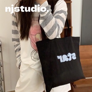 韩系简约帆布包女款大容量高级感单肩包小个子百搭通勤托特包夏季