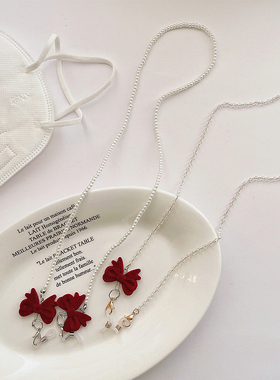 新年红色蝴蝶结圣诞个性少女口罩链防丢眼镜链耳机链时尚珍珠项链