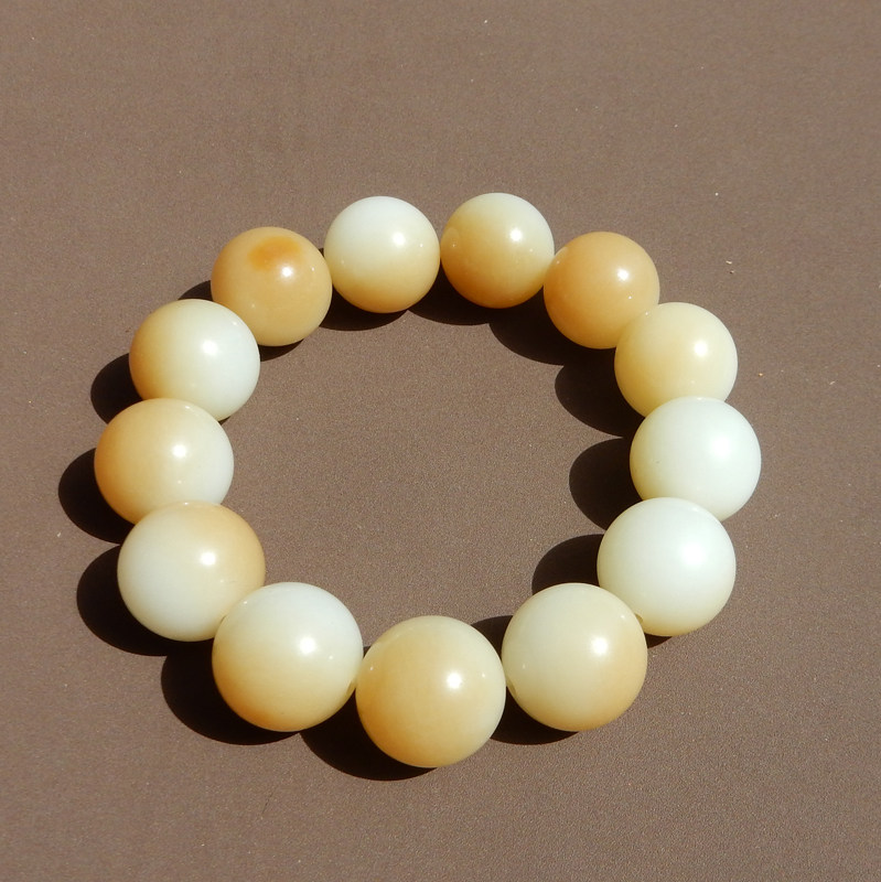 俄罗斯羊脂白玉带糖14mm圆珠手串