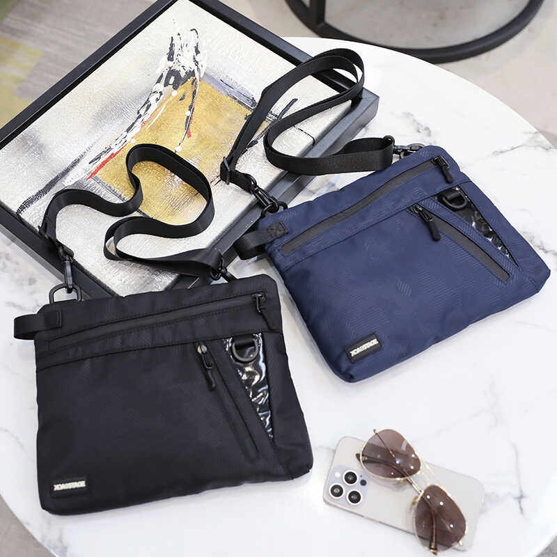 潮牌时尚个性单肩包男士韩版小斜挎包休闲多功能信封包日系邮差包