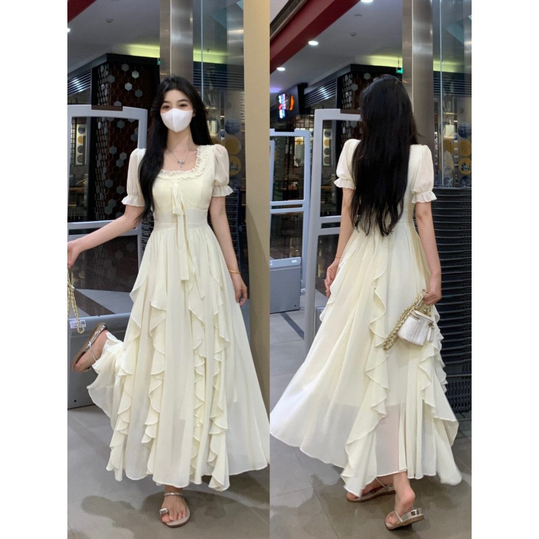 大码仙女杏色连衣裙2026新款微胖mm海边遮肚显瘦法式长裙子夏季