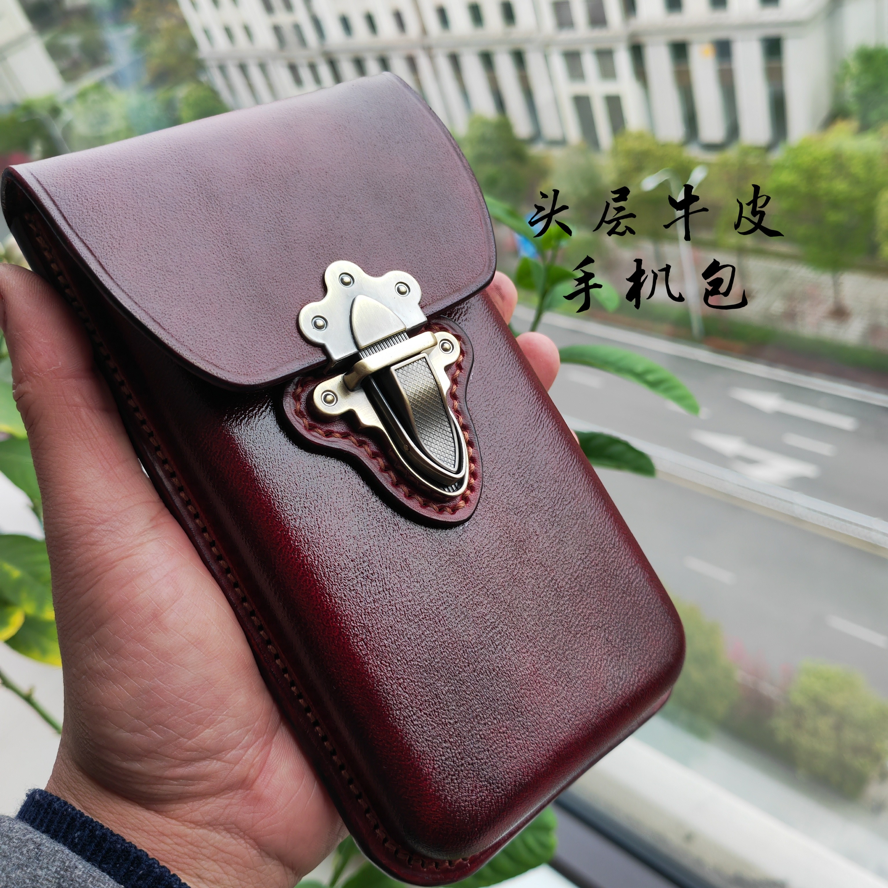 头层牛皮手机包翻盖式手机包尺寸长172宽86厚18毫米塑形工艺