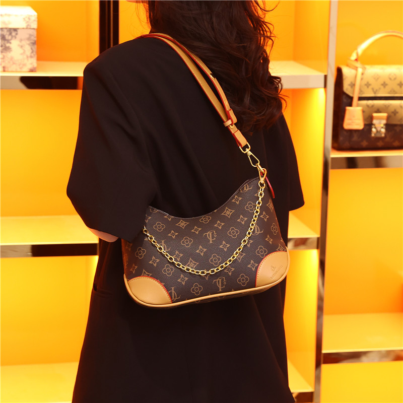 时尚包包女新款流行牛角包单肩腋下包气质斜挎包撞色印花女包