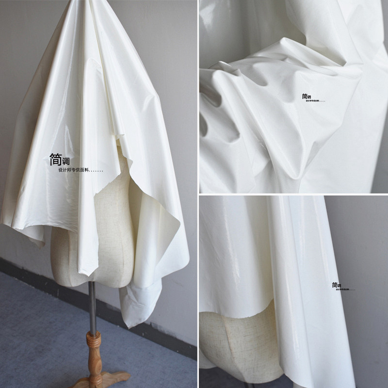 原创白色亮光弹力镜面pu皮革布料防水针织软皮设计师服装tpu布料