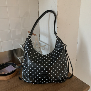 波点双肩包女2025新款大容量学生党通勤包爆款韩系上课休闲托特包