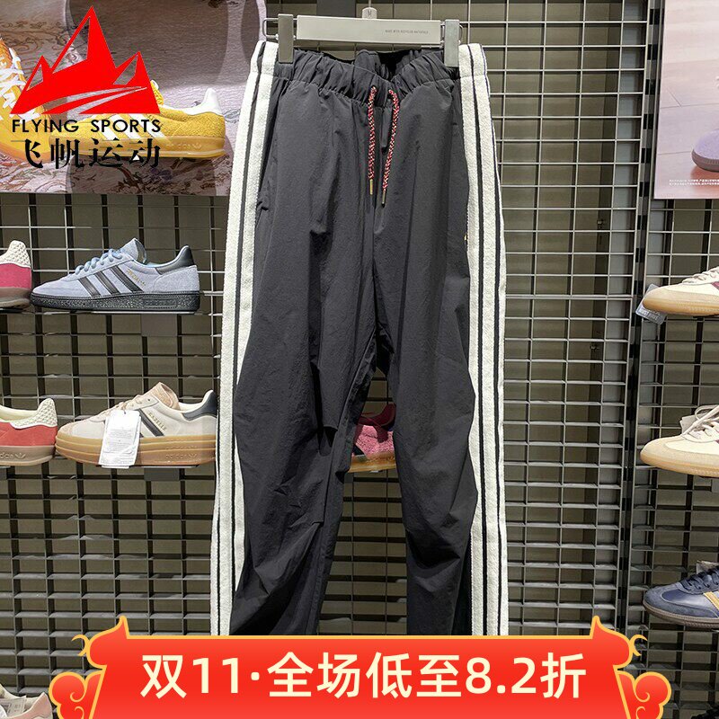 阿迪达斯男裤2026春新年款CNY防泼水三条纹休闲运动裤长裤 KR3077