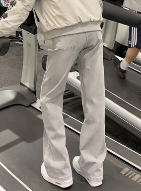 美式高街烟灰色弯刀牛仔裤男款夏季显腿长修身裤子显瘦直筒微喇裤