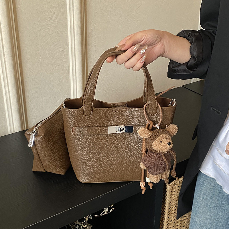 高级感小众包包女2026新款时尚复古百搭斜挎包女式通勤手提水桶包,箱包皮具/热销女包/男包,单肩包,淘宝优惠券,粉丝福利购,淘宝优惠卷