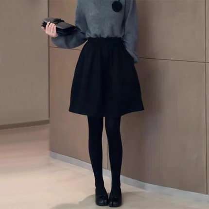 黑色厚款毛呢半身裙女2025秋冬新款时尚减龄百搭高腰显瘦花苞裙子
