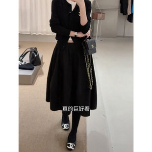 黑色蓬蓬半身裙女2026秋季新款高腰显瘦a字中长款百搭气质花苞裙