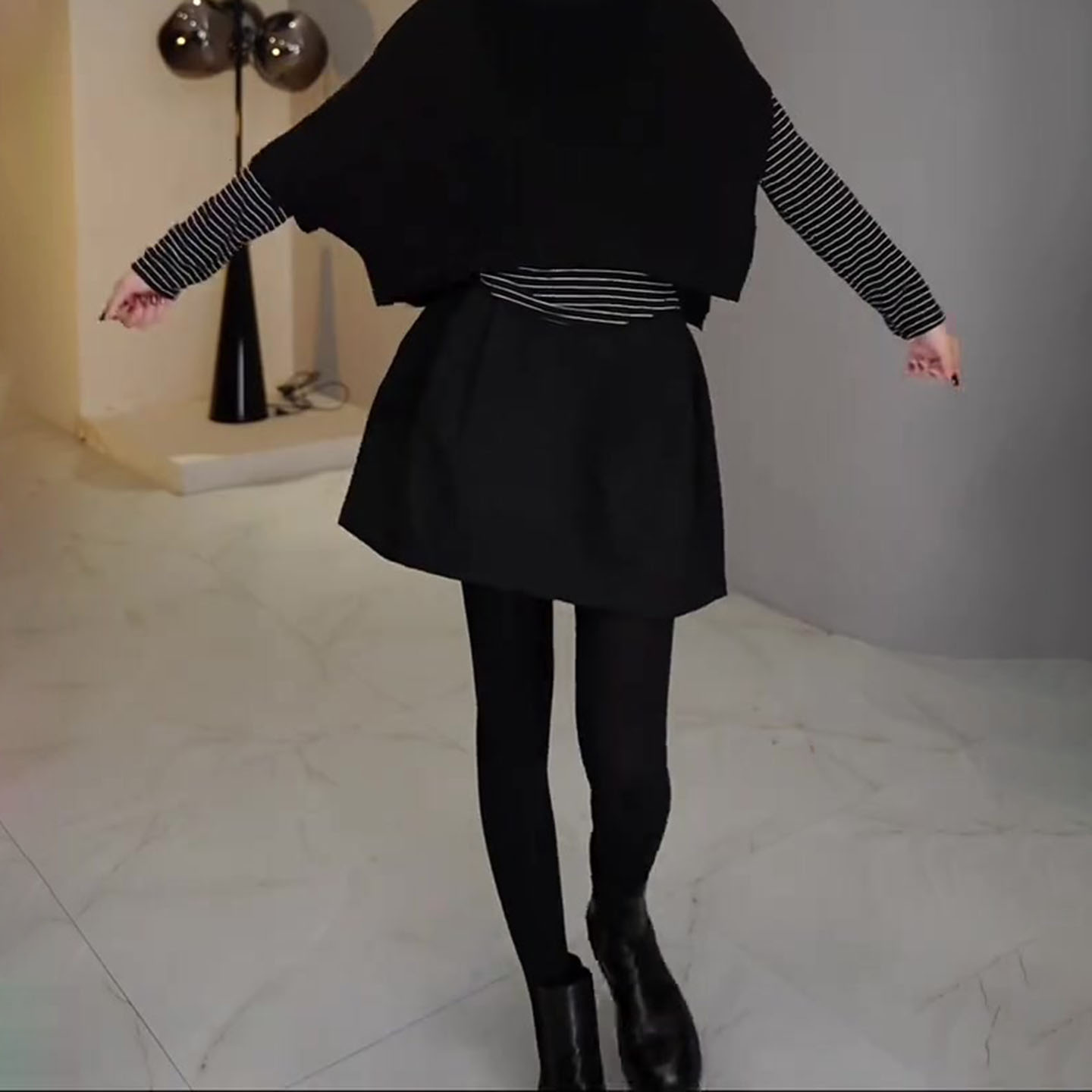 黑色花苞短裙女2025秋冬流行新款高腰显瘦简约宽松时尚百搭半身裙