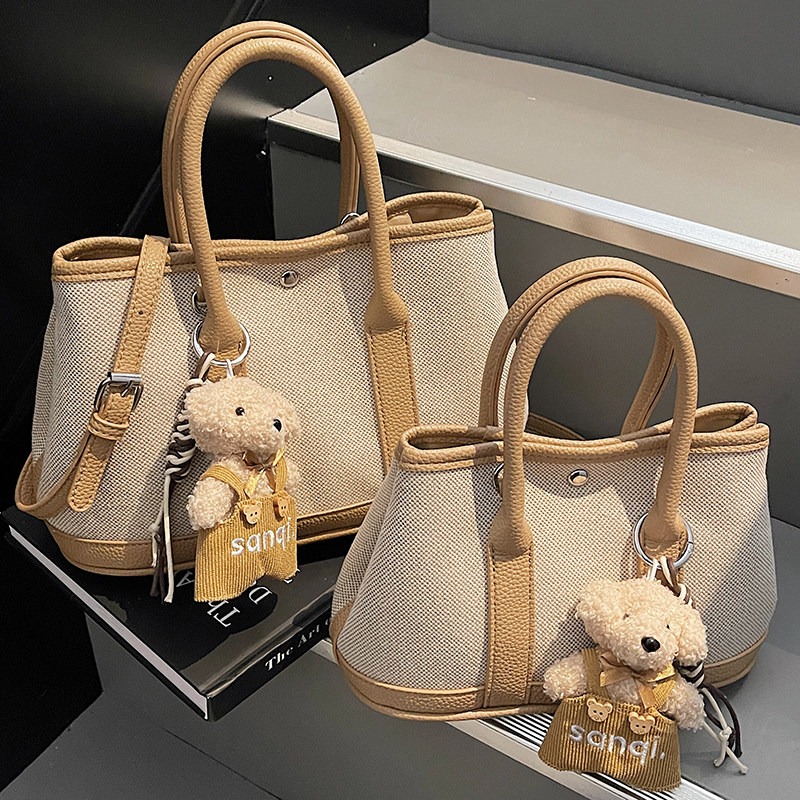 高颜值小清新水桶包女包2025新款大容量通勤手拎包小众单肩斜挎包,箱包皮具/热销女包/男包,水桶包,淘宝优惠券,粉丝福利购,淘宝优惠卷