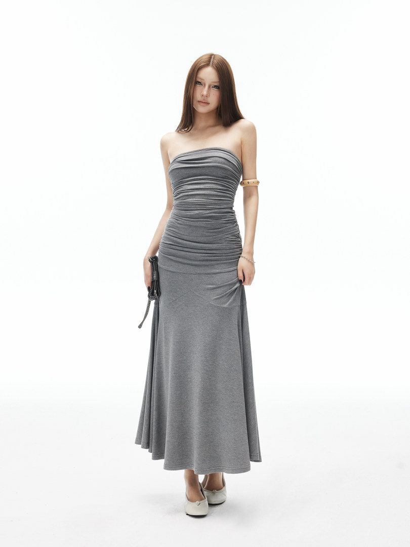 Gray strapless ruched maxi dress worn by a model