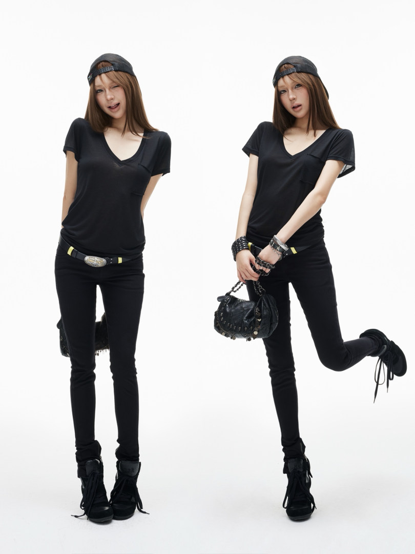 Black casual streetwear outfit modeled on a white background