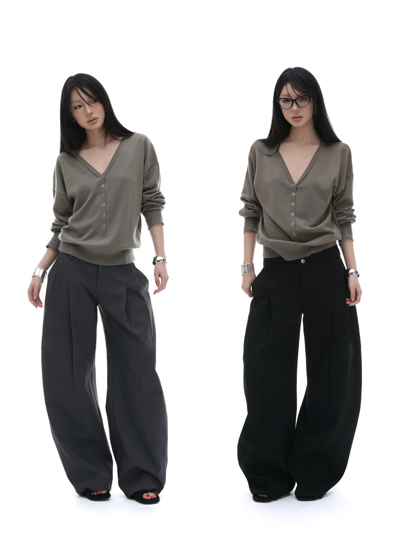Two models wearing gray V-neck long-sleeve tops with wide-leg pants