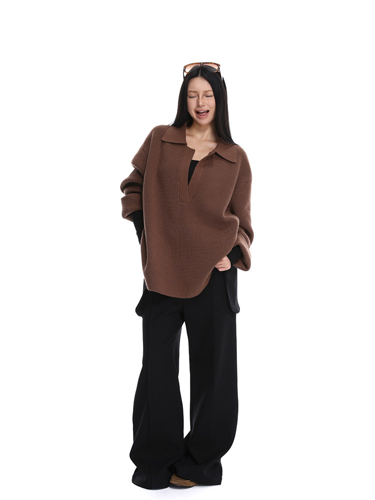 Brown oversized knit sweater worn by model