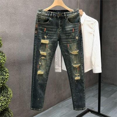 进口品质涂鸦破洞牛仔裤男