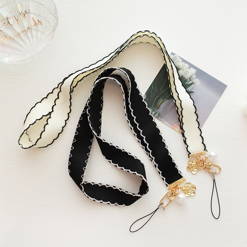 优雅小香风黑白花珍珠手机挂绳