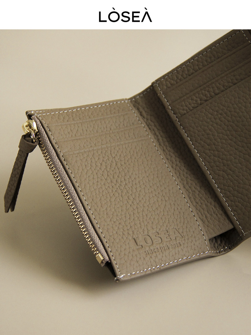 Brown textured leather wallet or card holder with zipper detail
