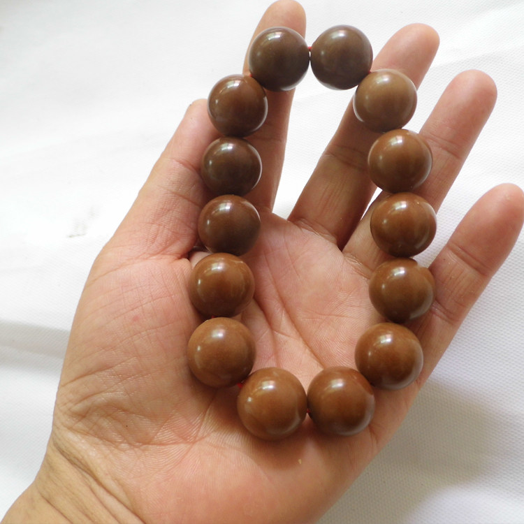 纯天然黄色大手持燕思南文玩精品稀有罕见黄菩提根风化果念珠车挂