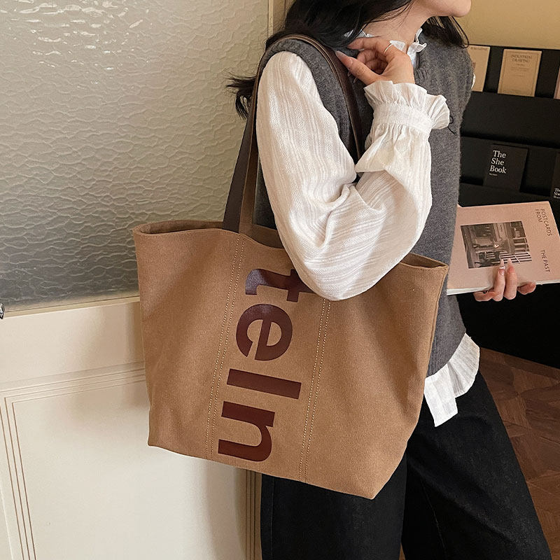 字母帆布包包女2026新款潮时尚百搭托特包大容量通勤购物袋单肩包,箱包皮具/热销女包/男包,托特包,淘宝优惠券,粉丝福利购,淘宝优惠卷