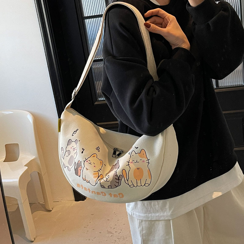 休闲斜挎饺子包女2025新款潮韩版单肩大容量上课通勤包百搭帆布包