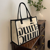 字母帆布包包女大容量2025新款 手提上班通勤托特包百搭单肩妈咪包