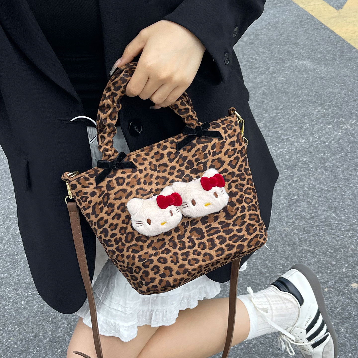 可爱豹纹KT猫斜挎包手提水桶包