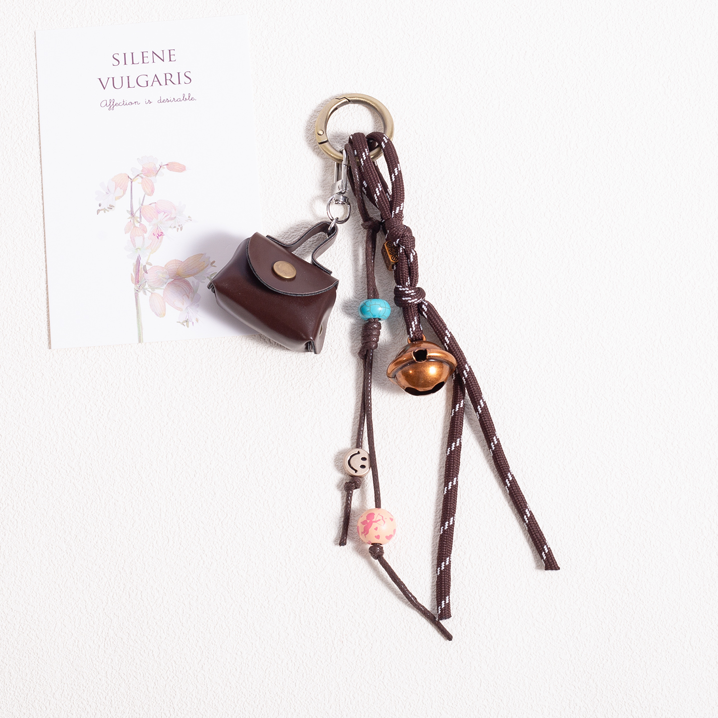 原创设计手作串珠皮牌钥匙绳挂件金属装饰包挂高级感书包背包挂饰