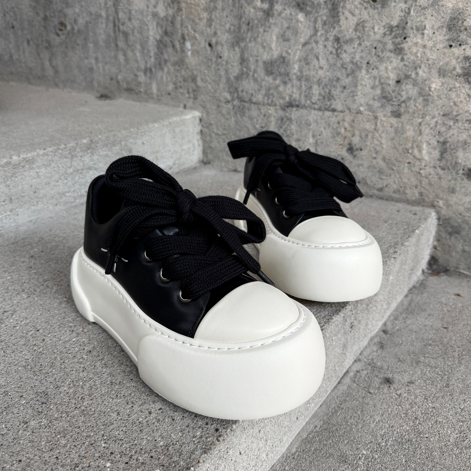 踩屎感黑白面包鞋男真皮板鞋厚底