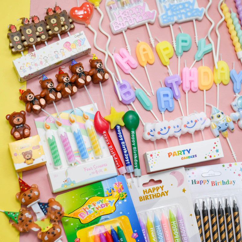 马卡龙色生日快乐字母蜡烛蛋糕