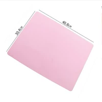 Светло-голубая силиконовая подушечка розового цвета.