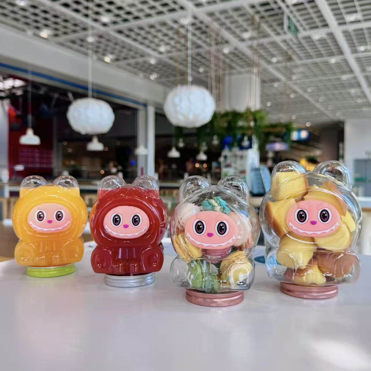 网红布布奶茶杯果切包装透明塑料卡通小怪兽果汁瓶糖果瓶