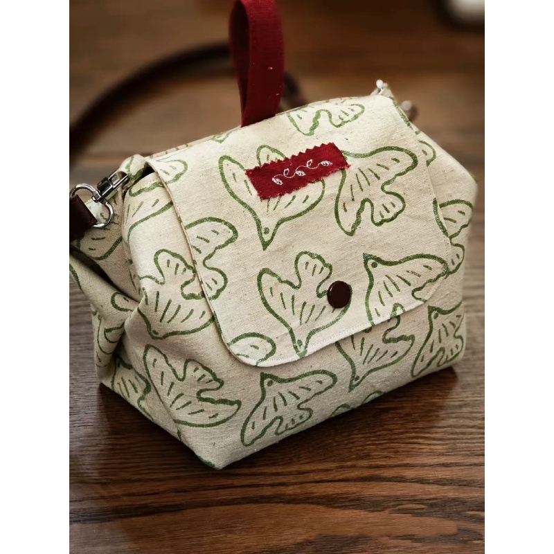 小众文艺飞鸟印花大肚包2025新款百搭单肩斜挎包杂物通勤帆布包女