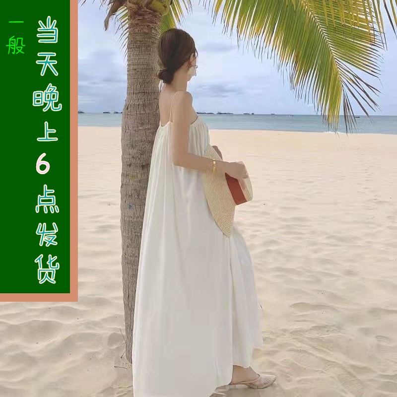 泰国海边度假沙滩裙2022新款海南三亚旅游衣服穿搭白色吊带连衣裙