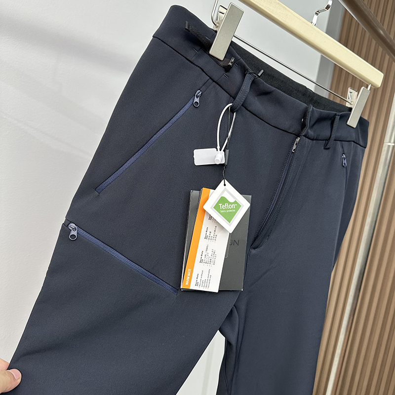平替款户外运动防风防泼水可调腰围休闲秋冬加绒保暖软壳裤长裤男