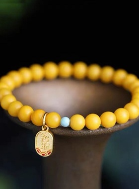 新款鸡油黄蜜蜡手链桃花吊坠闺蜜